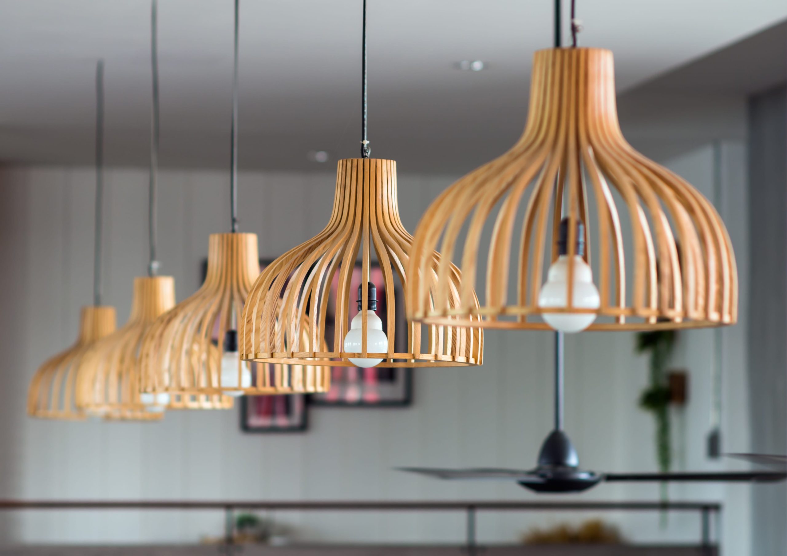 Intricate timber shades on pendant lighting.