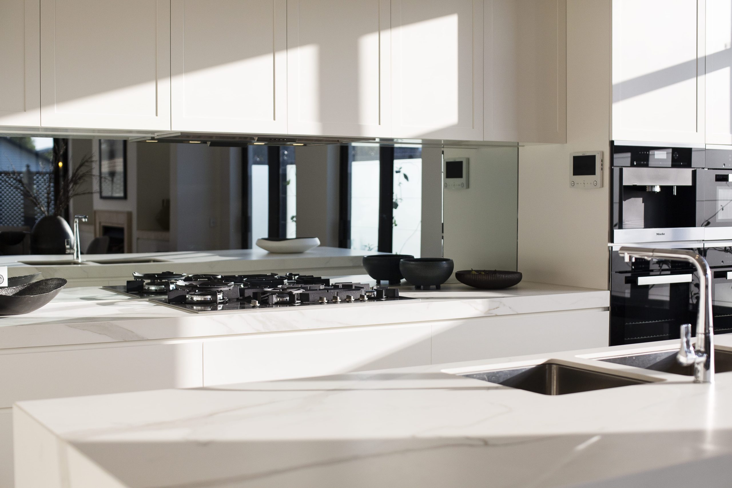 A sleek, modern kitchen showcasing the appliances.